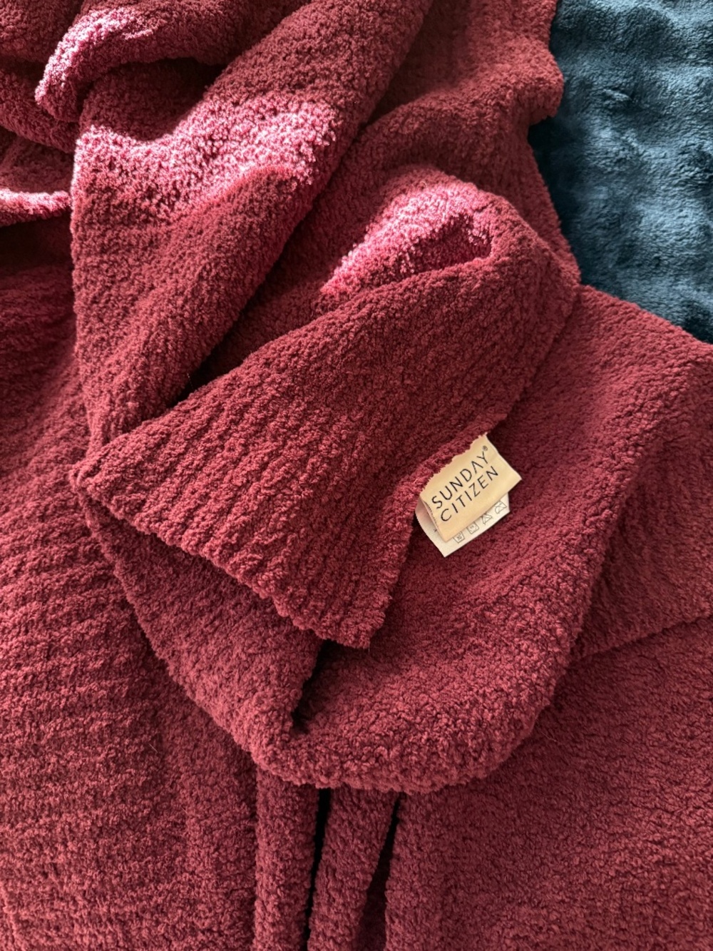 Sunday Citizen throw in Cherry Lacquer